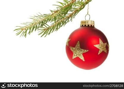 red christmas ball hanging on a branch. red christmas ball hanging on a branch isolated on white background