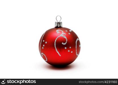 Red christmas ball with silver pattern isolated on white background