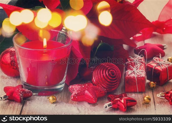 red christmas candle with balls and stars, retro toned