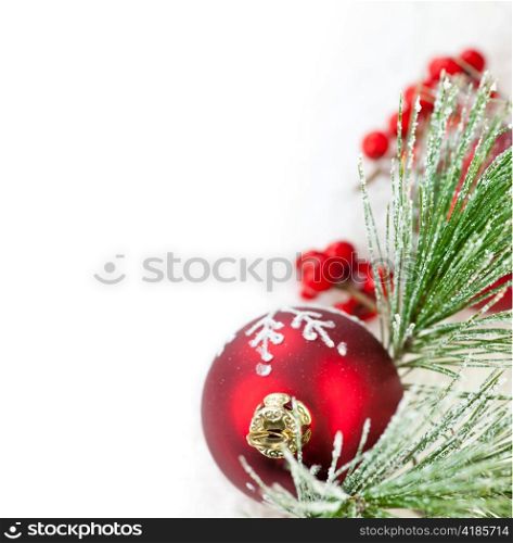 Red Christmas decoration with pine needles with copy space