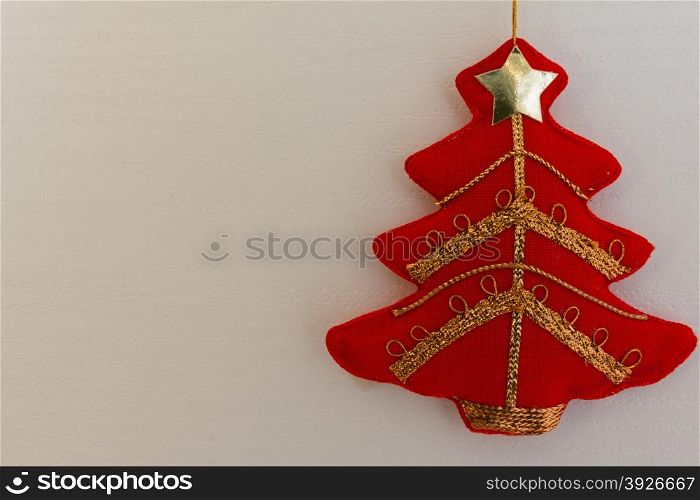 red christmas tree textile decoration with golden rope