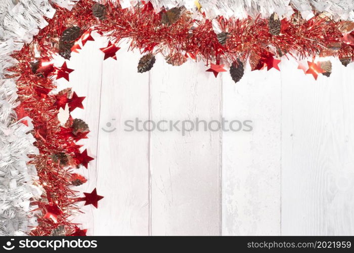 red christmas wreath in frame with space to write text for christmas or new year