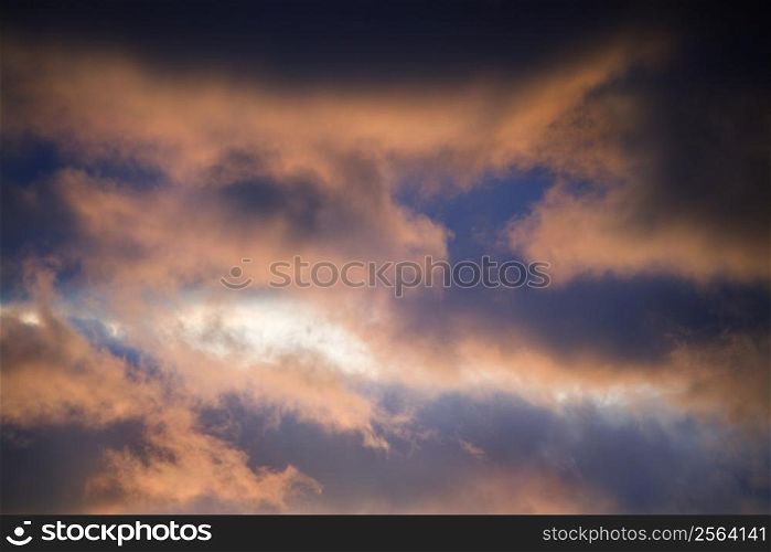 Red clouds in blue sky at sunset in Maui, Hawaii, USA.
