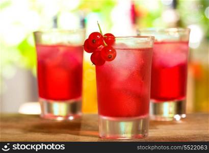 red cocktails with red currant