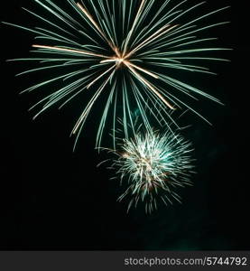 Red colorful fireworks on the black sky background