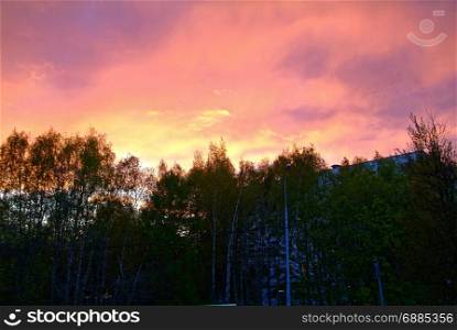 red colorful sunset in spring in Moscow, the zyuzino district