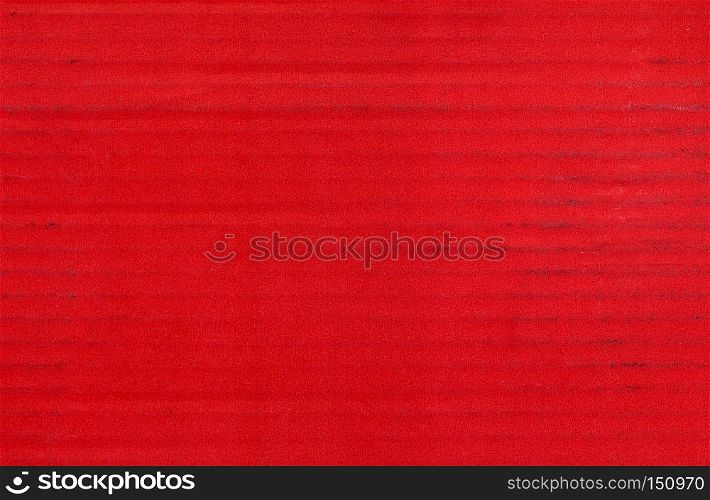 red corrugated cardboard texture useful as a background. red corrugated cardboard texture background