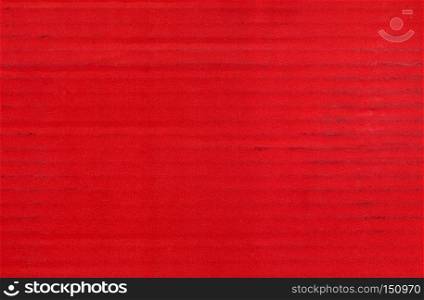red corrugated cardboard texture useful as a background. red corrugated cardboard texture background