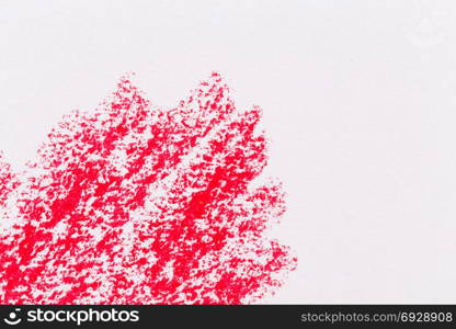 Red crayon draw on a white paper