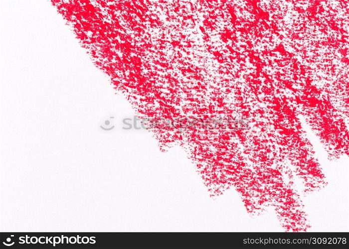 Red crayon draw on a white paper texture background