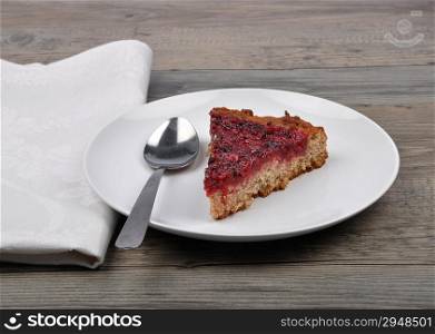 Red currant cake on wood