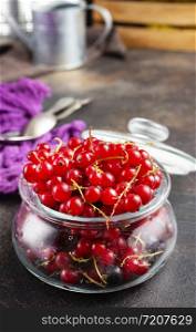 red currant in glass bank, fresh berries
