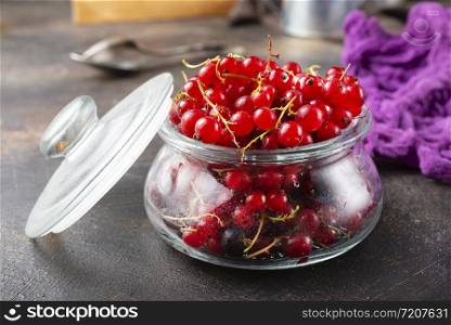 red currant in glass bank, fresh berries