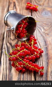 red currant on the wooden table,stock photo