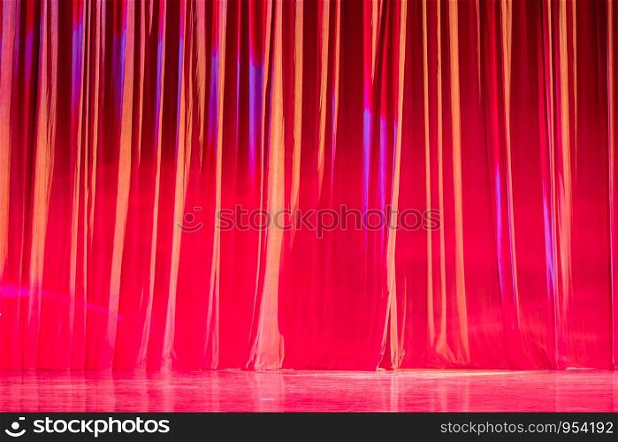 Red curtains and motion in the Theater between shows.
