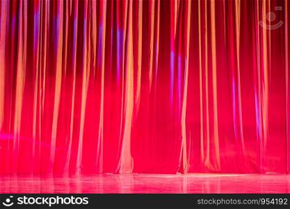 Red curtains and motion in the Theater between shows.