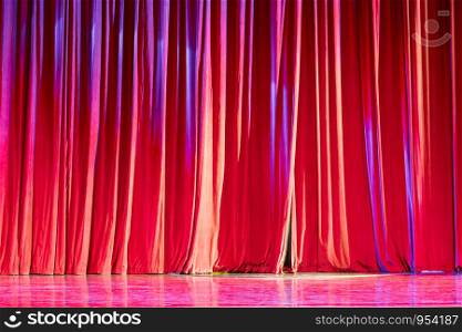 Red curtains and the spotlight in the Theater between shows.