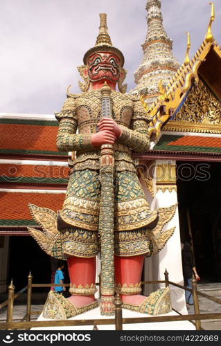 Red demon near gate of Wat Phra Keo, Thailand, Bangkok
