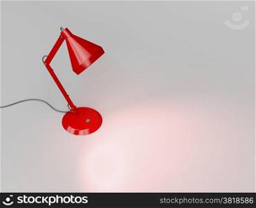 Red desk lamp illuminates the gray background