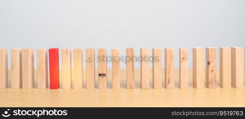 Red domino wooden block on table. Business planning, Risk Management, Solution, leader, strategy, different, Hiring, Human Resource and Unique Concepts