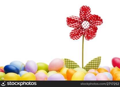 red drapery flower between easter eggs. red drapery flower between easter eggs with white background