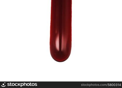 Red drop of blood isolated on white background