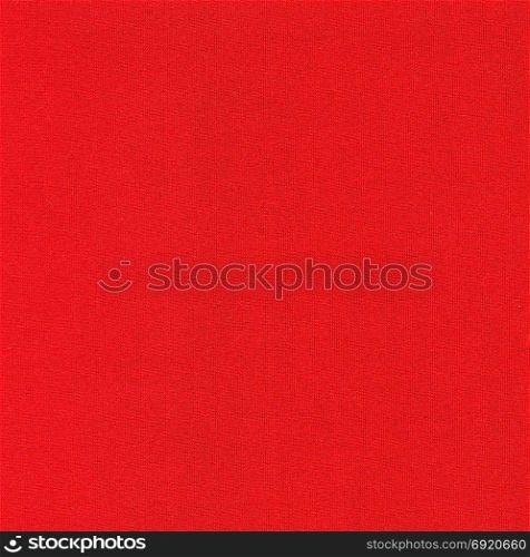 red fabric texture Christmas background. red fabric texture useful as a Christmas background