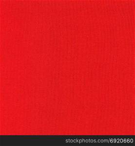 red fabric texture Christmas background. red fabric texture useful as a Christmas background