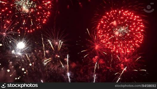 Red Firework celebrate anniversary happy new year 2022, 4th of july holiday festival. red firework in night time celebrate national holiday. Countdown to new year 2022 festival party time event