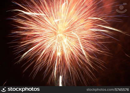Red fireworks on the black sky background