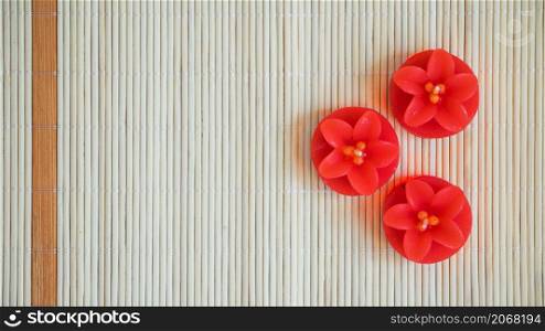 red flower shaped candles
