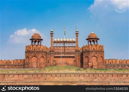 Red Fort (Lal Qila) Delhi with Indian flag in Old Delhi, India - World Heritage Site, India famous travel tourist landmark and symbol
