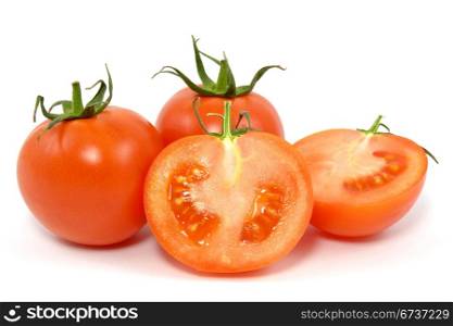 red fresh tomatos over a white background
