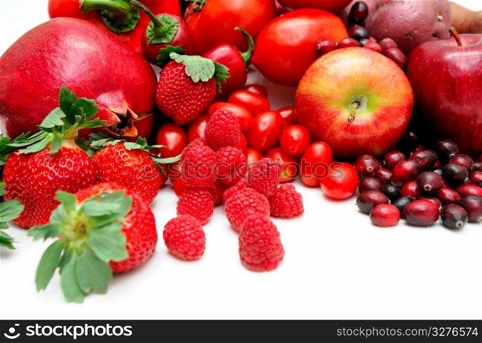 Red Fruit. Different fruits that are all red in color including strawberries, raspberries, apples, cranberries and more.