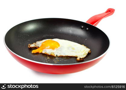 red frying pan with fried egg