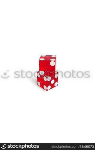 Red gambling dice over white background