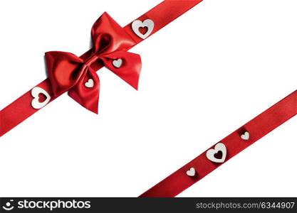 Red gift bow and hearts. Red gift bow and hearts isolated on white background