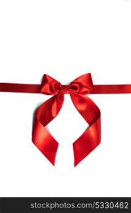 Red gift bow on white. Red gift bow isolated on white background