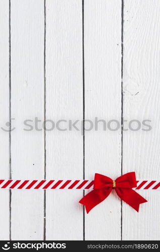 red gift bow with ribbon table . Resolution and high quality beautiful photo. red gift bow with ribbon table . High quality and resolution beautiful photo concept