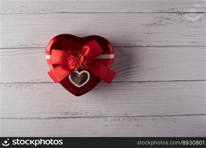 Red Gift box on wood background