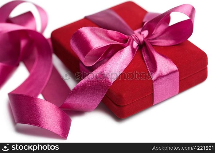 red gift box with pink ribbon isolated