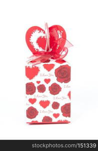 red gift box, with ribbon and Christmas decoration