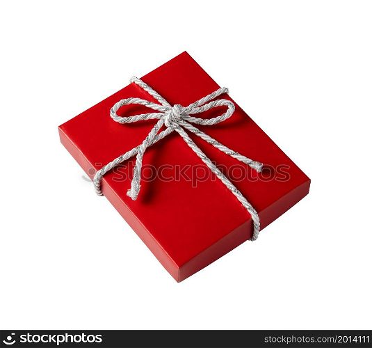 Red gift box with white and silver cord rope ribbon isolated on white background