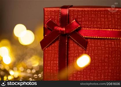 red gift boxes and holiday Christmas lights