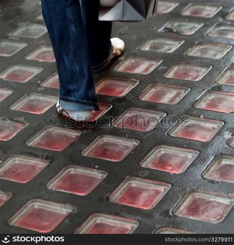 Red glass blocks on a sidewalk in Manhattan, New York City, U.S.A.