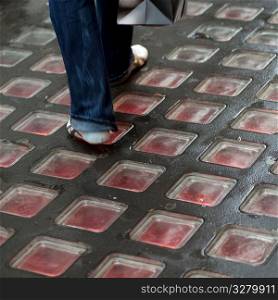 Red glass blocks on a sidewalk in Manhattan, New York City, U.S.A.