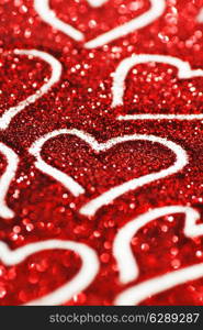 Red glitter background with hearts, valentines day design