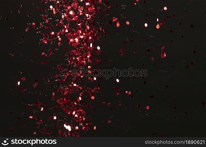 red glitter on black background . Resolution and high quality beautiful photo. red glitter on black background . High quality and resolution beautiful photo concept