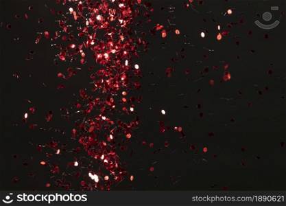 red glitter on black background . Resolution and high quality beautiful photo. red glitter on black background . High quality and resolution beautiful photo concept