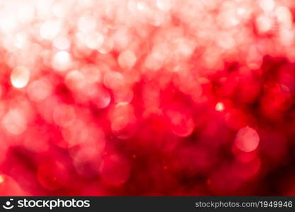 Red glitter vintage lights background defocused for festivals and celebrations